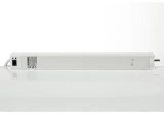 Brel Home BG-980 curtain-track motor: a long white rectangular housing with a label, a cable leaving at the left and a metal drive pin at the right