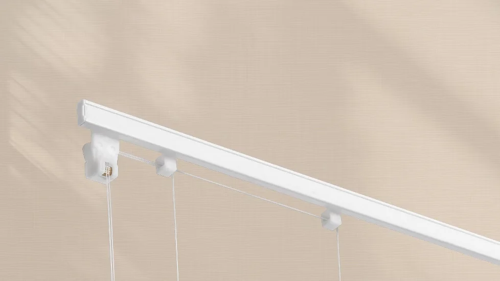 Vako 20/01 Cord roman blind system: a white open headrail with a white cord lock at the left end, a thin cord running along it past two white guides, and cords hanging down