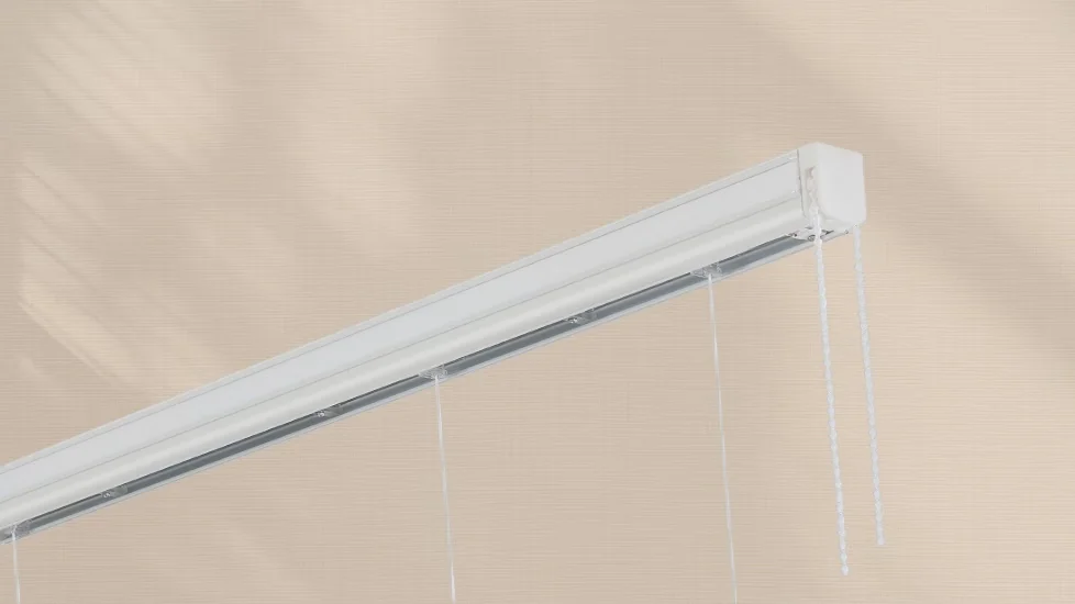 Vako 20/09 Open roman blind system: a white open headrail with an end cap on the right, a bead chain and thin cords hanging from it